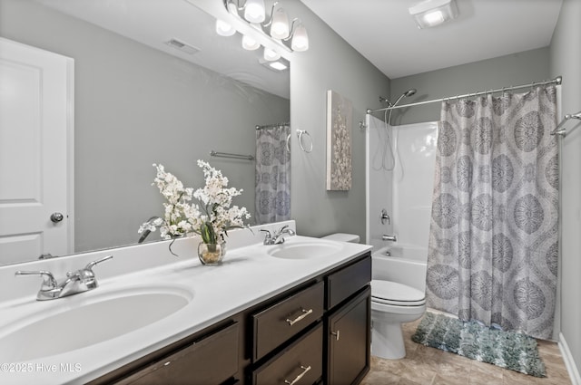 97 Violetear Rdg, Hampstead, NC 28443 - bathroom featuring toilet, double vanity, and shower / bath combo with shower curtain