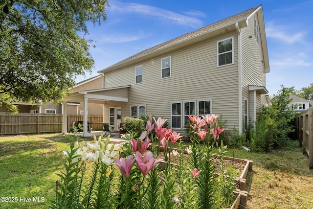 97 Violetear Rdg, Hampstead, NC 28443 - back of house featuring a patio area