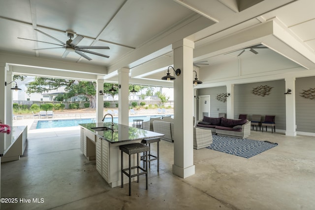 97 Violetear Rdg, Hampstead, NC 28443 - view of patio / terrace with outdoor lounge area, a ceiling fan, and a sink