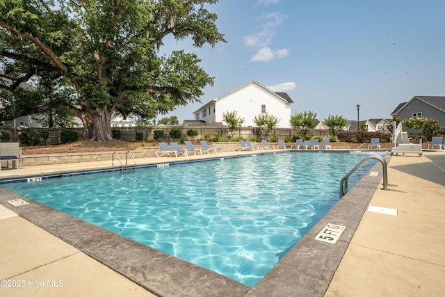 97 Violetear Rdg, Hampstead, NC 28443 - community pool featuring a patio area
