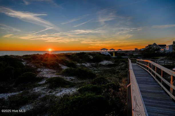 4920 E Beach Dr, Oak Island, NC 28465 - dock featuring a water view