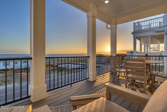4920 E Beach Dr, Oak Island, NC 28465 - wooden terrace with a water view