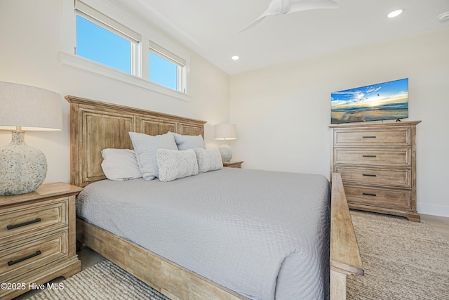 4920 E Beach Dr, Oak Island, NC 28465 - bedroom with recessed lighting, a ceiling fan, and light wood-style floors