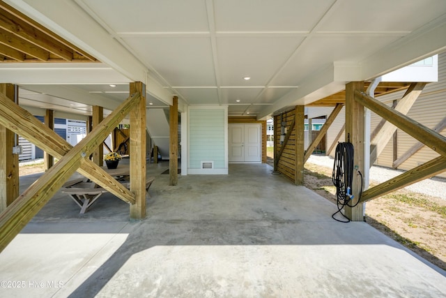 4920 E Beach Dr, Oak Island, NC 28465 - view of patio / terrace featuring a carport