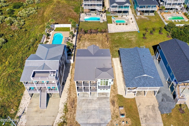 4920 E Beach Dr, Oak Island, NC 28465 - drone / aerial view of a pool area