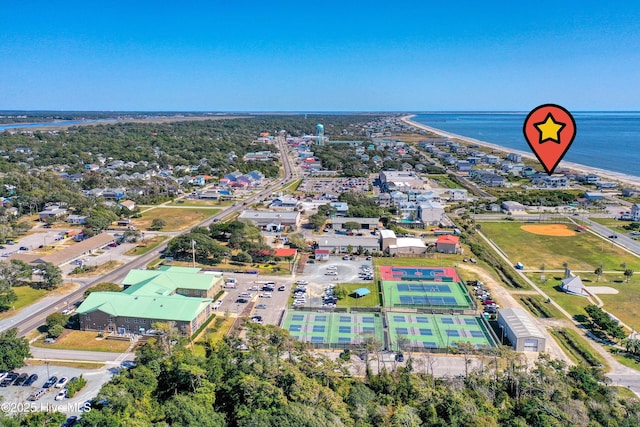 4920 E Beach Dr, Oak Island, NC 28465 - aerial view of property and surrounding area featuring a large body of water