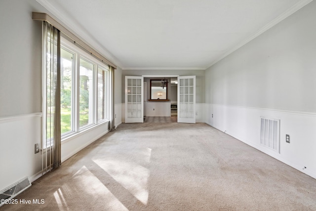 280 Cornwallis Rd, Teachey, NC 28464 - unfurnished room featuring carpet floors, crown molding, and french doors
