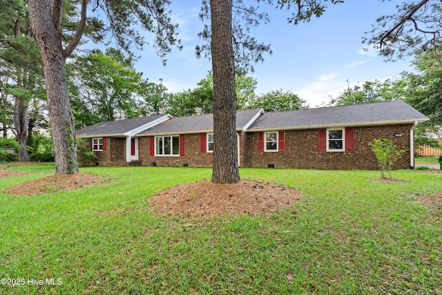 280 Cornwallis Rd, Teachey, NC 28464 - ranch-style house featuring crawl space, a front yard, and brick siding