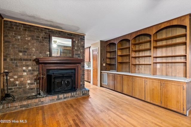 280 Cornwallis Rd, Teachey, NC 28464 - unfurnished living room featuring light wood-style floors and a textured ceiling