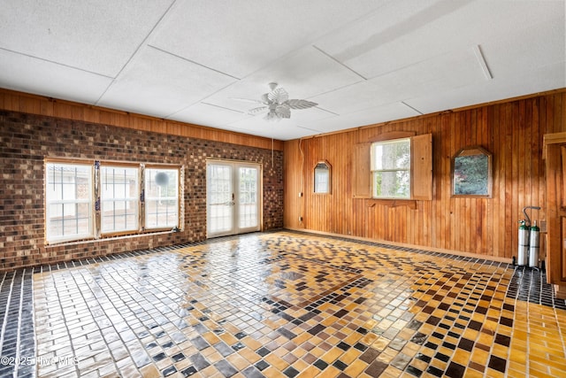 280 Cornwallis Rd, Teachey, NC 28464 - unfurnished room with a ceiling fan and wood walls