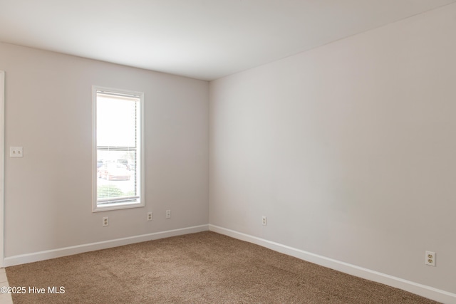 2525 Flint Dr, Wilmington, NC 28401 - carpeted empty room featuring baseboards