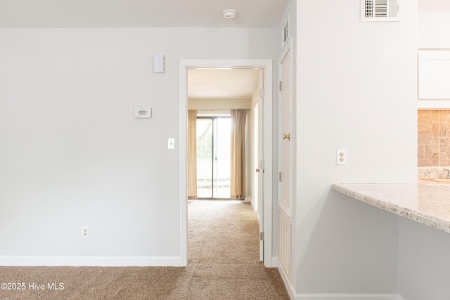 2525 Flint Dr, Wilmington, NC 28401 - hallway with carpet flooring and baseboards