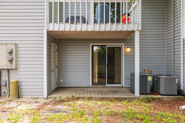 2525 Flint Dr, Wilmington, NC 28401 - entrance to property with cooling unit and a balcony