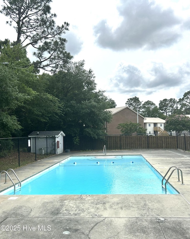 2525 Flint Dr, Wilmington, NC 28401 - community pool featuring a patio