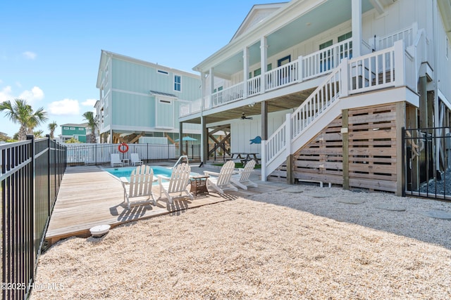 1044 Ocean Blvd W, Supply, NC 28462 - view of swimming pool with a ceiling fan, a patio area, and stairway