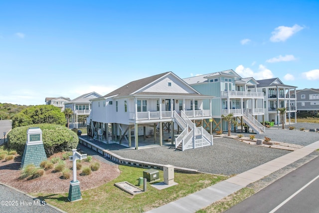 1044 Ocean Blvd W, Supply, NC 28462 - view of play area with a porch and stairs