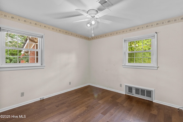 350 Toulon Dr, Wilmington, NC 28405 - unfurnished room featuring wood finished floors, a ceiling fan, and wallpapered walls