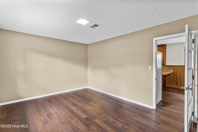 350 Toulon Dr, Wilmington, NC 28405 - empty room with dark wood-style flooring and baseboards