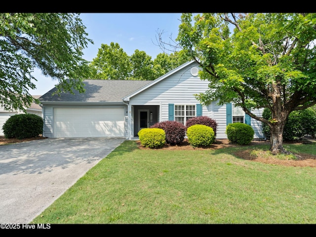 406 Endicott Ct, Wilmington, NC 28411 - view of front of house featuring an attached garage, concrete driveway, a front yard, and roof with shingles