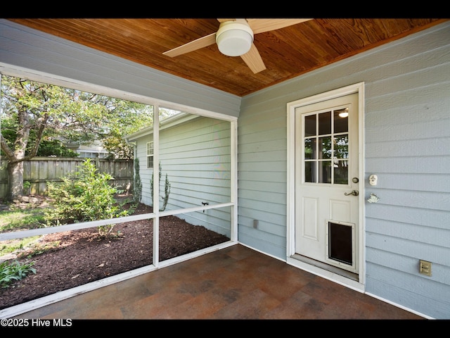 406 Endicott Ct, Wilmington, NC 28411 - unfurnished sunroom featuring a ceiling fan