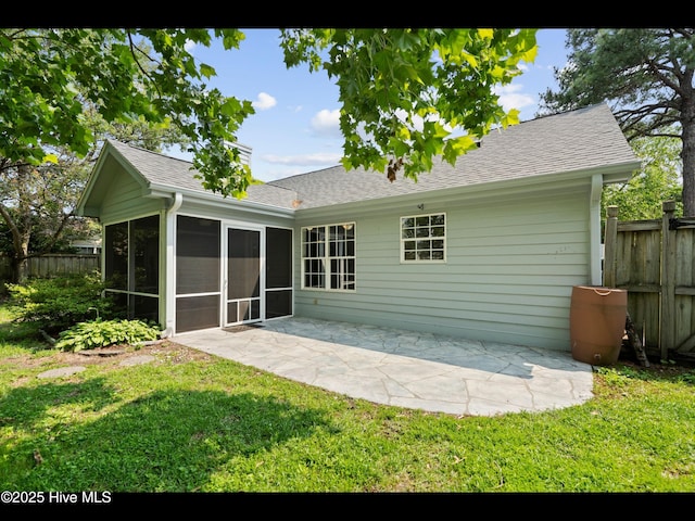406 Endicott Ct, Wilmington, NC 28411 - rear view of property with a sunroom, roof with shingles, and a patio