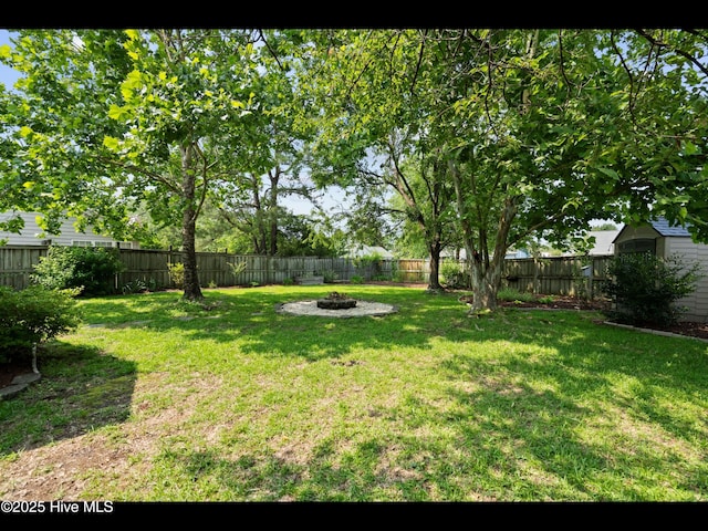 406 Endicott Ct, Wilmington, NC 28411 - view of yard featuring an outdoor fire pit