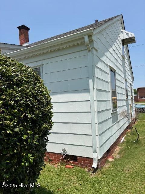 908 E 7th St, Lumberton, NC 28358 - view of side of property featuring crawl space and a yard
