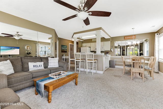 330 S Middleton Dr NW Unit 1201, Calabash, NC 28467 - living room with a ceiling fan, a chandelier, and plenty of natural light