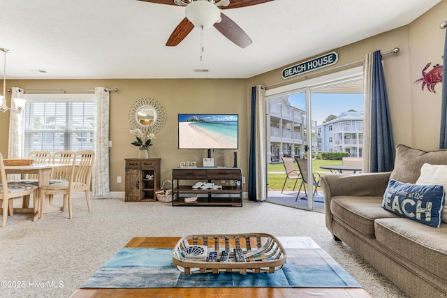 330 S Middleton Dr NW Unit 1201, Calabash, NC 28467 - living area featuring a ceiling fan, carpet flooring, and a chandelier
