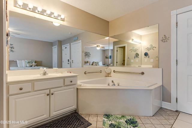 330 S Middleton Dr NW Unit 1201, Calabash, NC 28467 - full bathroom with a garden tub, vanity, tile patterned floors, and ceiling fan