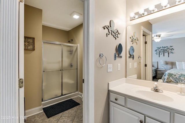 330 S Middleton Dr NW Unit 1201, Calabash, NC 28467 - full bath with ensuite bathroom, tile patterned flooring, a shower stall, vanity, and a ceiling fan