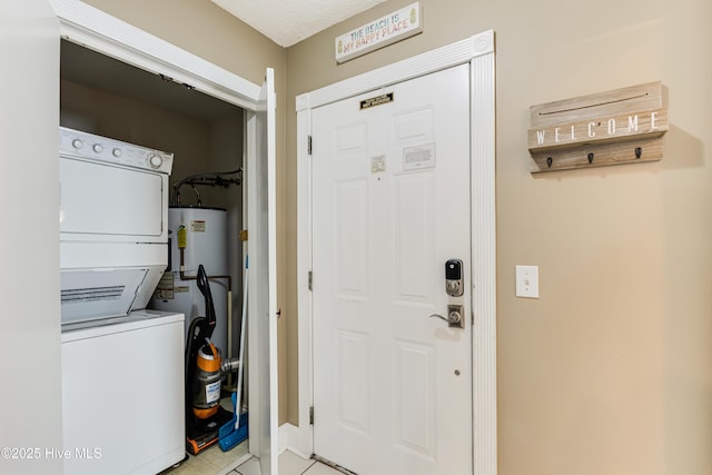 330 S Middleton Dr NW Unit 1201, Calabash, NC 28467 - washroom with stacked washer / drying machine, light tile patterned flooring, and water heater
