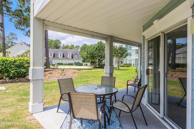 330 S Middleton Dr NW Unit 1201, Calabash, NC 28467 - view of patio / terrace with outdoor dining area