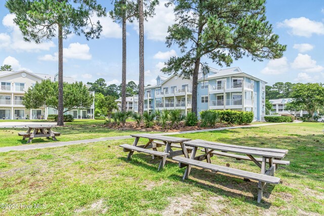 330 S Middleton Dr NW Unit 1201, Calabash, NC 28467 - view of home's community with a yard