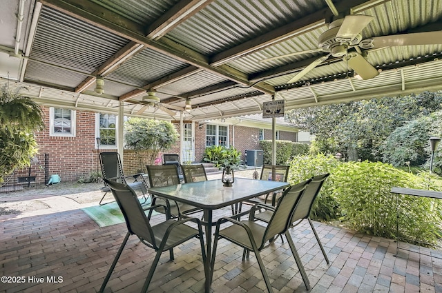 1409 Knollwood Dr NW, Wilson, NC 27896 - view of patio with ceiling fan, outdoor dining space, central AC, and a gazebo