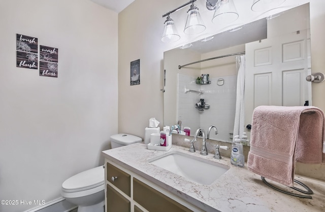 1409 Knollwood Dr NW, Wilson, NC 27896 - bathroom with toilet, vanity, and a shower with shower curtain