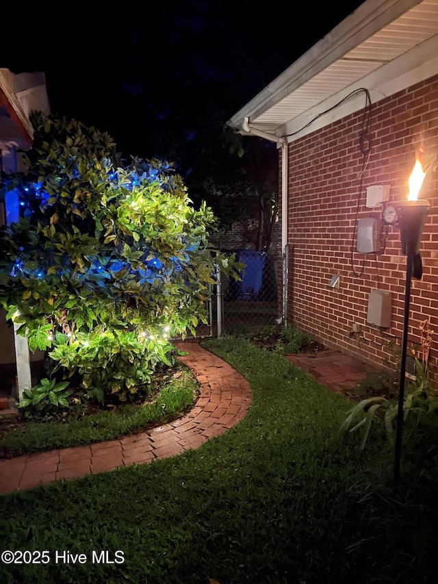 1409 Knollwood Dr NW, Wilson, NC 27896 - view of yard at twilight