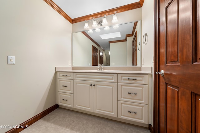6424 River Vista Dr, Wilmington, NC 28412 - bathroom featuring ornamental molding, vanity, tile patterned floors, and baseboards