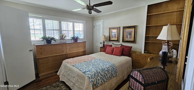 301 Graham St, Clinton, NC 28328 - bedroom with crown molding, dark wood-style floors, and a ceiling fan