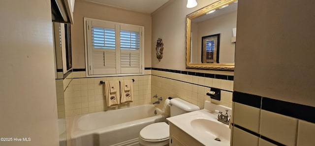 301 Graham St, Clinton, NC 28328 - full bath with toilet, tile walls, a bathtub, vanity, and wainscoting