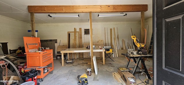 301 Graham St, Clinton, NC 28328 - basement with a workshop area and concrete block wall