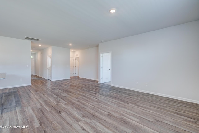 5380 Black Oak Ct, Winnabow, NC 28479 - empty room featuring wood finished floors and recessed lighting