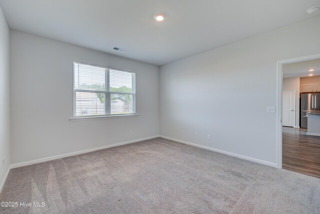 5380 Black Oak Ct, Winnabow, NC 28479 - carpeted empty room with baseboards and recessed lighting