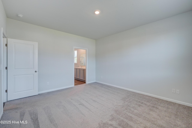 5380 Black Oak Ct, Winnabow, NC 28479 - unfurnished bedroom with carpet flooring and ensuite bathroom