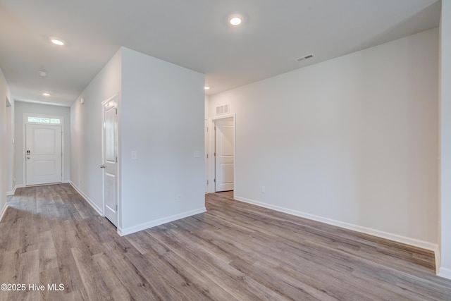 5380 Black Oak Ct, Winnabow, NC 28479 - spare room featuring wood finished floors and recessed lighting