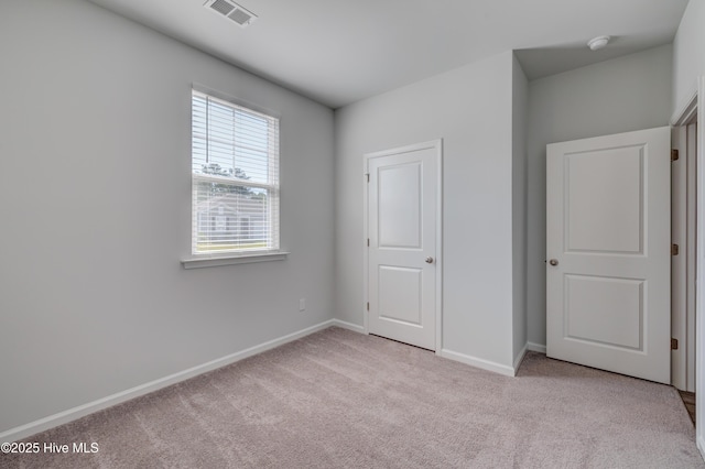 5380 Black Oak Ct, Winnabow, NC 28479 - unfurnished bedroom featuring carpet floors and baseboards