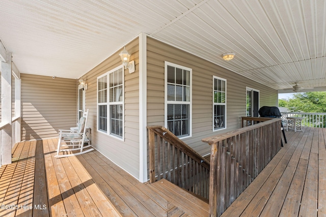 126 NE 5th St, Oak Island, NC 28465 - porch with a ceiling fan