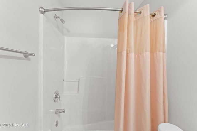 126 NE 5th St, Oak Island, NC 28465 - full bathroom with shower / bathtub combination with curtain and toilet