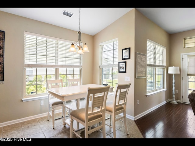 1232 Fence Post Ln, Carolina Shores, NC 28467 - dining space with baseboards and a chandelier