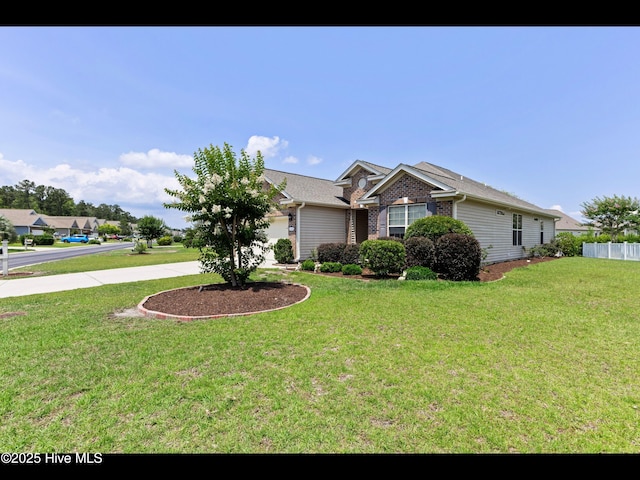 1232 Fence Post Ln, Carolina Shores, NC 28467 - ranch-style home with a garage, brick siding, and driveway